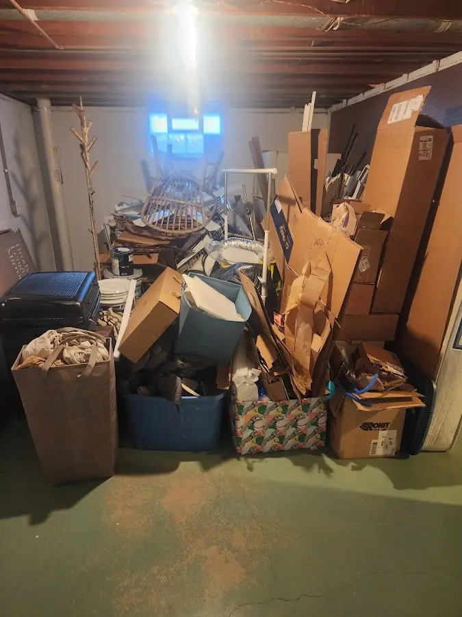 Roll-off dumpster container at job site for Construction Dumpster Rental in Suffolk